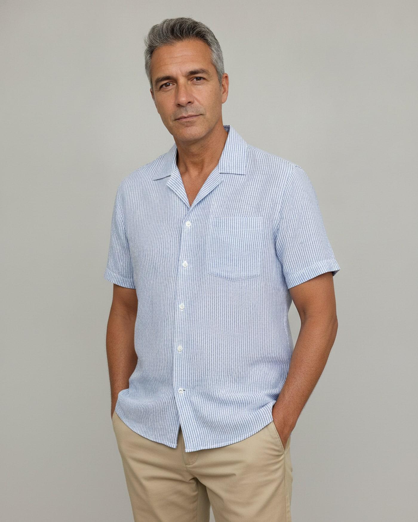 AI-generated product photo: Thursday Boots: White and indigo striped linen camp shirt